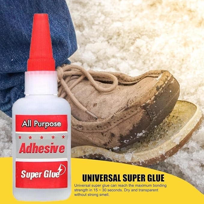 Super Glue bottle with a shoe on a textured surface