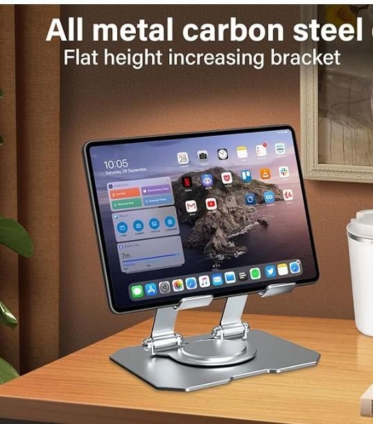 Tablet on a metal stand with text about carbon steel material