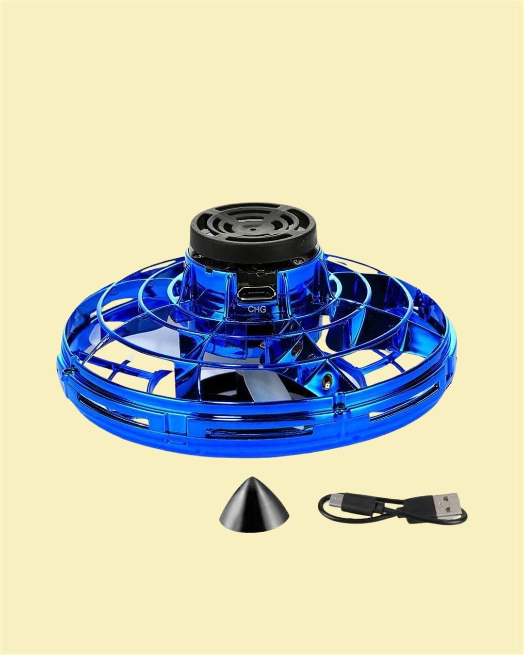 Blue handheld fan with black components on a beige background