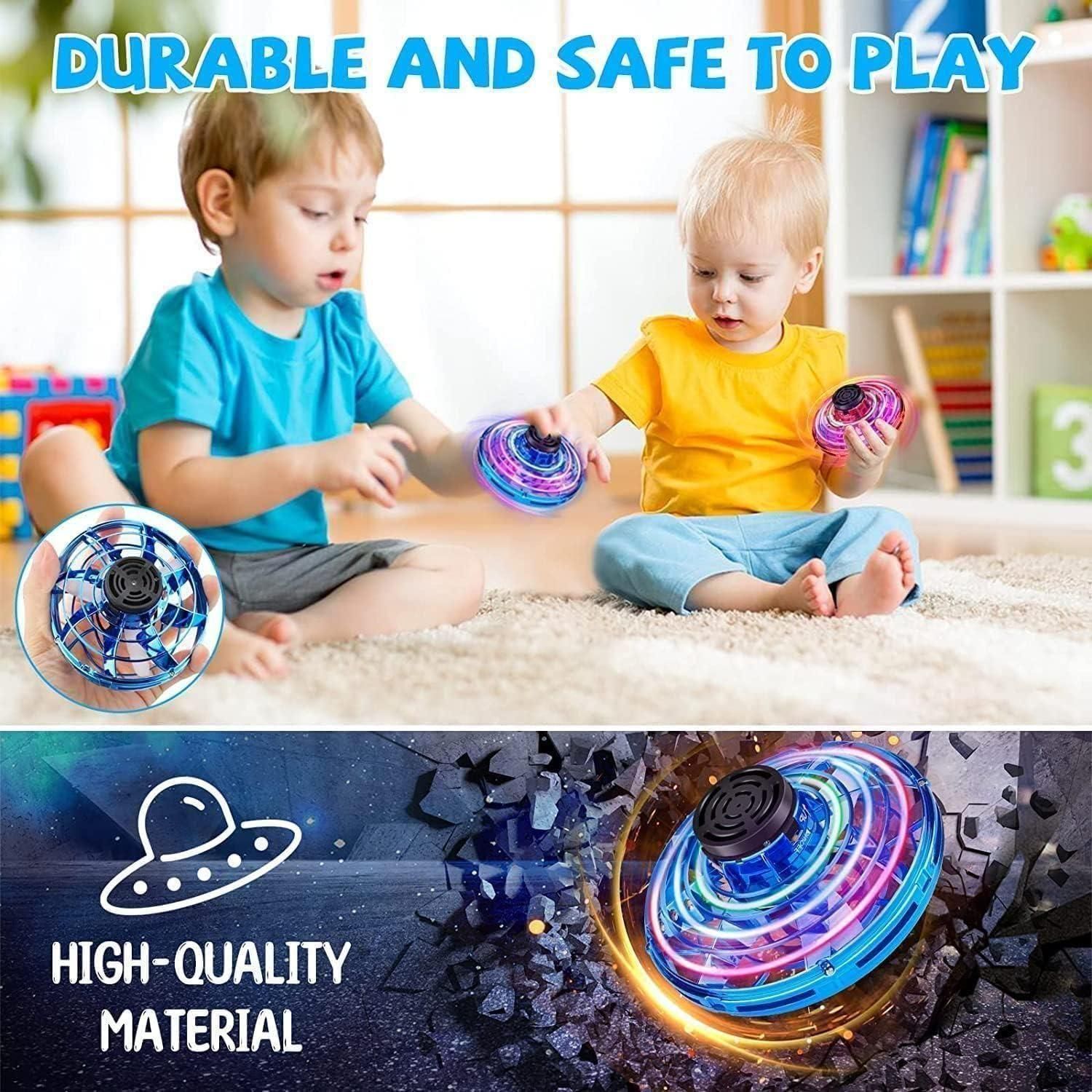 Two children playing with colorful spinning tops on a carpeted floor, with text highlighting durability and safety.