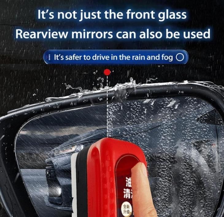 Red device being used on a car's rearview mirror with text about rain and fog safety.
