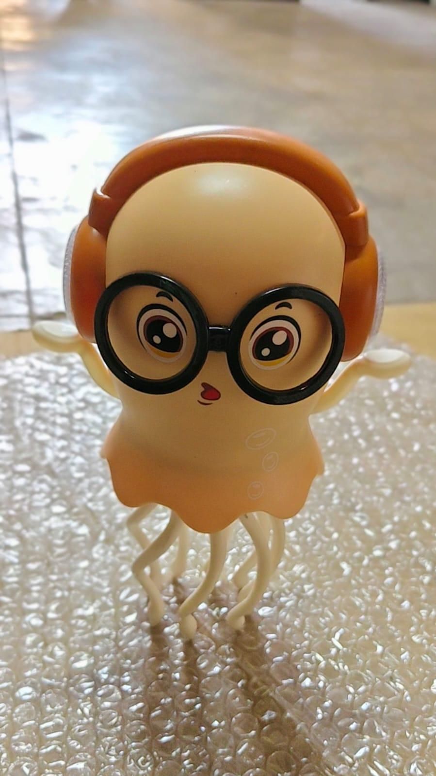 Toy figure with glasses and a round head on a textured surface