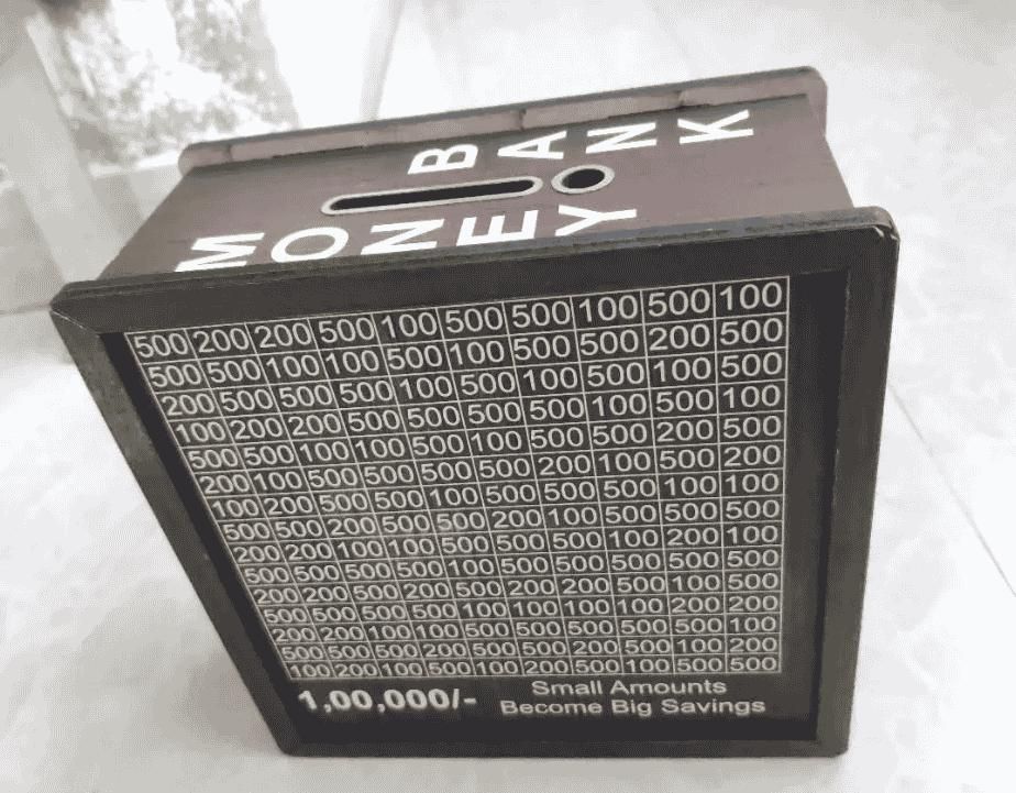 Black money counting machine with white text on a white background