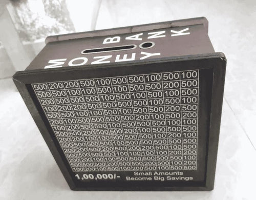 Black money counting machine with white text on a white background
