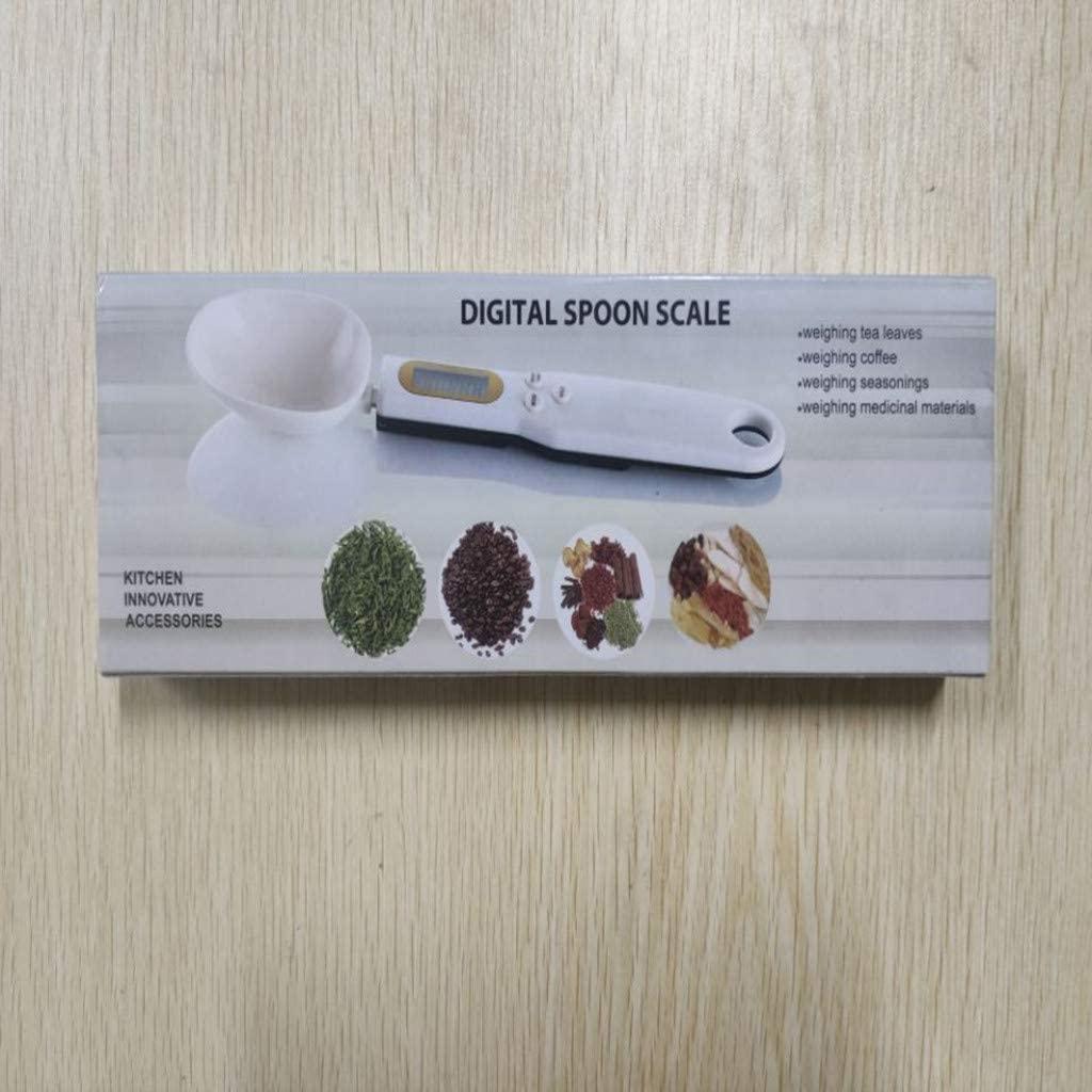 Digital spoon scale packaging on a wooden surface