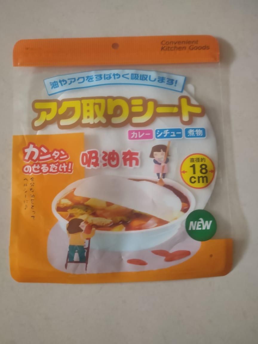 Cleaning sheet packaging with text and images on a plain background