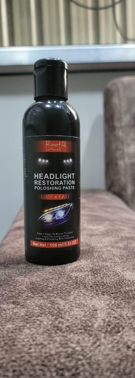 Bottle of headlight restoration polish on a textured surface