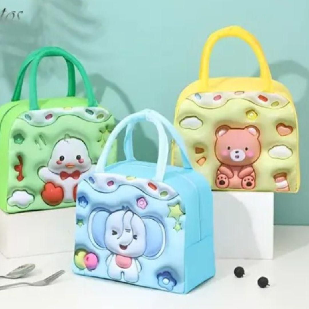 Three colorful cartoon-themed bags with character designs on a light blue background.